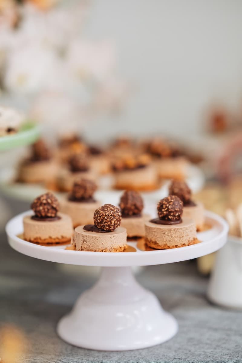 Cheesecakes on a white stand for an Adelaide event