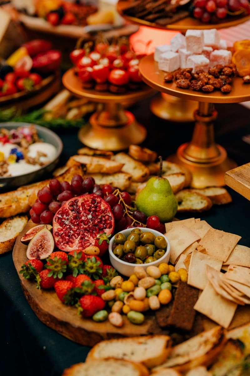 Impressive grazing display with gold stands and pomegranate for a Barossa Valley wedding event