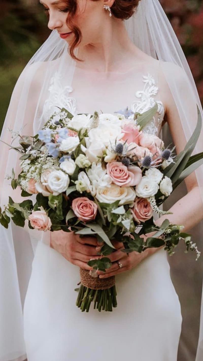 Adelaide bridal bouquet with pastel pink roses and blue thistle